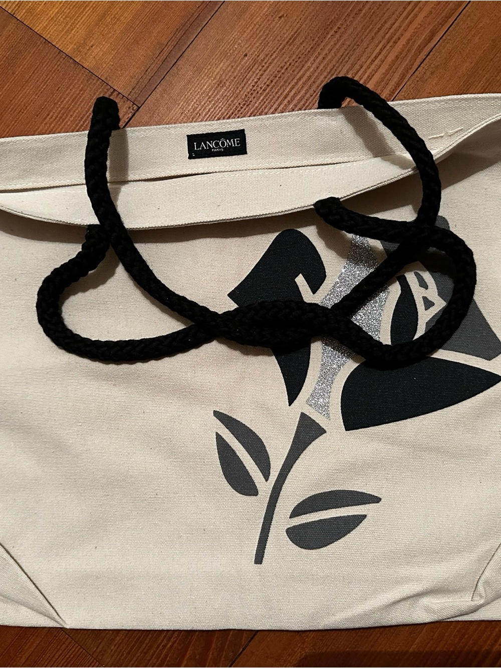 Lancôme Cream Canvas Tote with Black Floral Motif